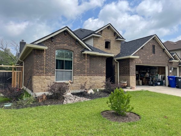 Brick Home with Gutters & Downspouts - Tri County Guttering Waco, Texas