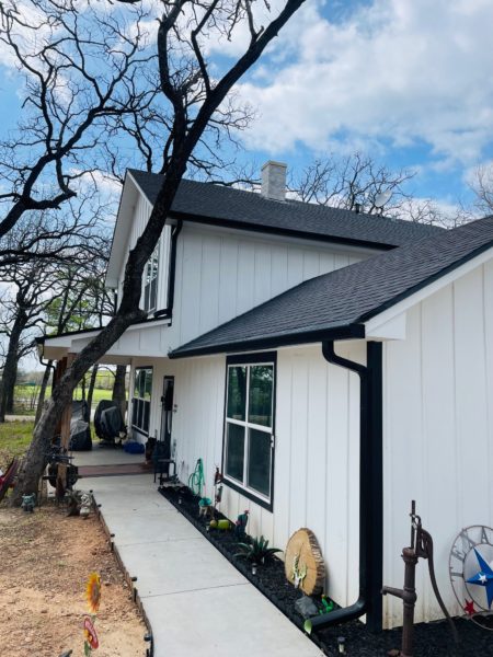 Tri-County Guttering Waco, Texas - White House with Black Gutters & Rain Spouts